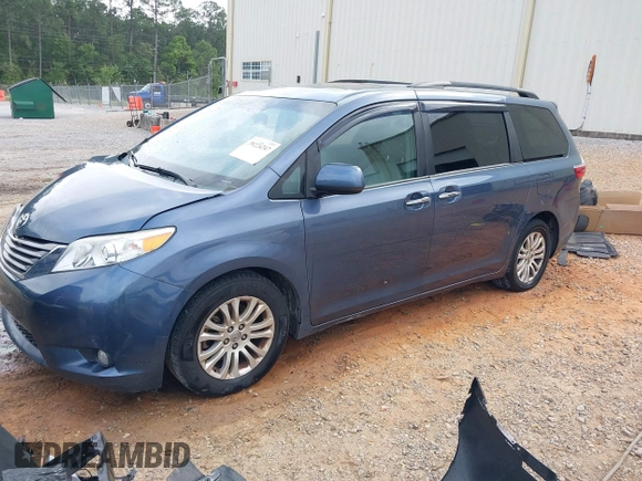 2015 Toyota Sienna XLE with VIN 5TDYK3DC1FS594123, listed as a IAAI auction lot 41944711 with 208,249 mi miles. Bid and sale history available at carsss.com. Image 2.