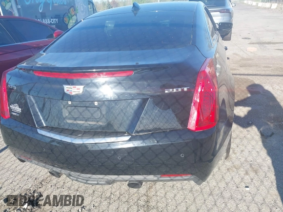 2017 Cadillac ATS Luxury AWD z VIN 1G6AH1RX3H0125723, wystawiony jako IAAI lot #42106626 z przebiegiem 174 119 mil mil oraz . Historia ofert i sprzedaży dostępna na DreamBid. Obrazek 16.