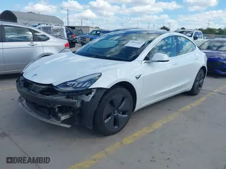 2019 Tesla Model 3 Mid Range with VIN 5YJ3E1EA0KF416799, listed as a IAAI auction lot 40662939 with 49,955 mi miles. Bid and sale history available at carsss.com. Image 19.
