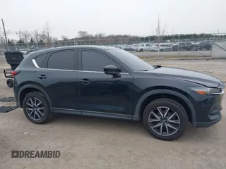2017 Mazda CX-5 Grand Touring with VIN JM3KFBDL6H0179557, listed as a IAAI auction lot 41546493 with 103,585 mi miles. Bid and sale history available at carsss.com. Image 13.