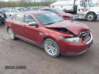 2014 Ford Taurus Limited z VIN 1FAHP2F80EG172007, wystawiony jako IAAI lot #42102543 z przebiegiem 143 798 mil mil oraz . Historia ofert i sprzedaży dostępna na DreamBid. Obrazek 1.