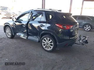 2013 Mazda CX-5 Grand Touring with VIN JM3KE2DE4D0127827, listed as a IAAI auction lot 41817214 with 108,295 mi miles. Bid and sale history available at carsss.com. Image 3.