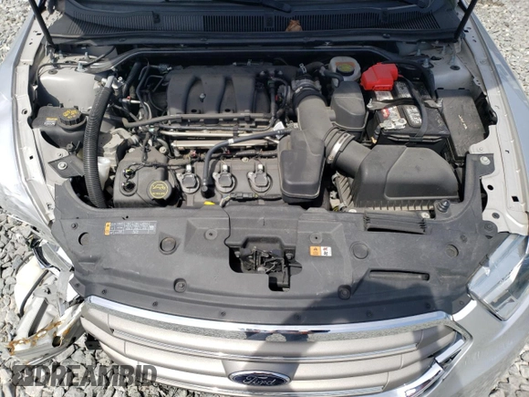 2018 Ford Taurus SEL with VIN 1FAHP2E87JG137928, listed as a Copart auction lot 53438695 with 56,874 mi miles and Salvage title. Bid and sale history available at DreamBid. Image 11.