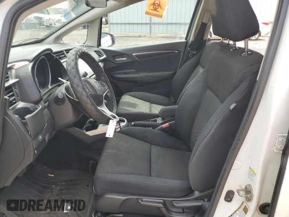2015 Honda Fit EX-L with VIN 3HGGK5H80FM717893, listed as a Copart auction lot 58069985 with 140,926 mi miles and Clean title. Bid and sale history available at DreamBid. Image 7.