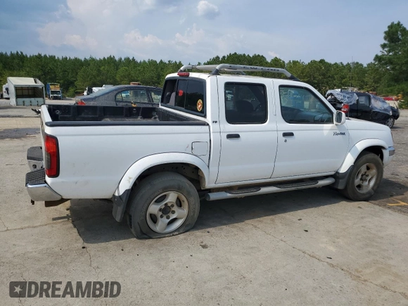 2000 Nissan Frontier XE with VIN 1N6ED27T1YC385792, listed as a Copart auction lot 62268225 with 291,906 mi miles and Salvage title. Bid and sale history available at DreamBid. Image 3.