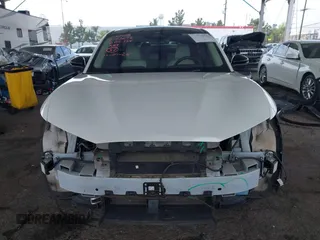 2021 Ford Mustang Mach-E Premium с VIN 3FMTK3SU6MMA27937, выставлен на аукционе IAAI как лот 42033076 с пробегом 90 743 миль миль и . История ставок и продаж доступна на DreamBid. Изображение 13.