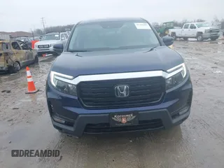 2022 Honda Ridgeline RTL-E with VIN 5FPYK3F72NB036226, listed as a IAAI auction lot 41706285 with 30,869 mi miles and . Bid and sale history available at DreamBid. Image 13.