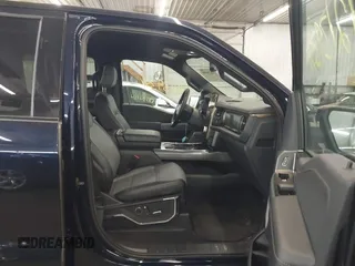 2023 Ford F-150 Lightning Pro with VIN 1FTVW1EL4PWG22900, listed as a IAAI auction lot 42139391 with 6,569 mi miles and . Bid and sale history available at DreamBid. Image 5.