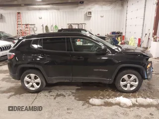 2022 Jeep Compass Latitude with VIN 3C4NJDBB5NT134974, listed as a IAAI auction lot 41379076 with 66,433 mi miles and . Bid and sale history available at DreamBid. Image 13.