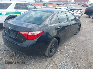2019 Toyota Corolla L with VIN 2T1BURHE9KC236995, listed as a IAAI auction lot 41900101 with 162,810 mi miles. Bid and sale history available at carsss.com. Image 4.