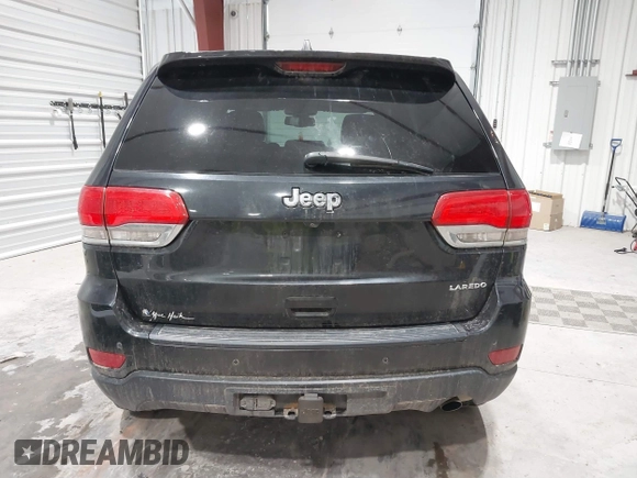 2015 Jeep Grand Cherokee Altitude with VIN 1C4RJEAG1FC193988, listed as a IAAI auction lot 41308825 with 156,601 mi miles. Bid and sale history available at carsss.com. Image 16.