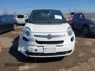 2014 FIAT 500L Lounge z VIN ZFBCFACHXEZ028896, wystawiony jako IAAI lot #41751360 z przebiegiem 157 966 mil mil oraz . Historia ofert i sprzedaży dostępna na DreamBid. Obrazek 6.