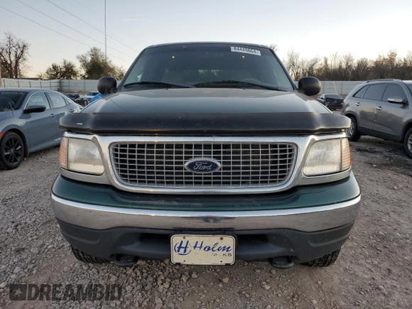 1999 Ford Expedition XLT with VIN 1FMPU18L0XLB96873, listed as a Copart auction lot 84449864 with 161,128 mi miles and Clean title. Bid and sale history available at DreamBid. Image 5.
