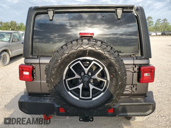 2024 Jeep Wrangler Rubicon z VIN 1C4PJXFG6RW261748, wystawiony jako Copart lot #51479585 z przebiegiem 7 911 mil mil oraz Szkoda całkowita • Salvage title. Historia ofert i sprzedaży dostępna na DreamBid. Obrazek 6.