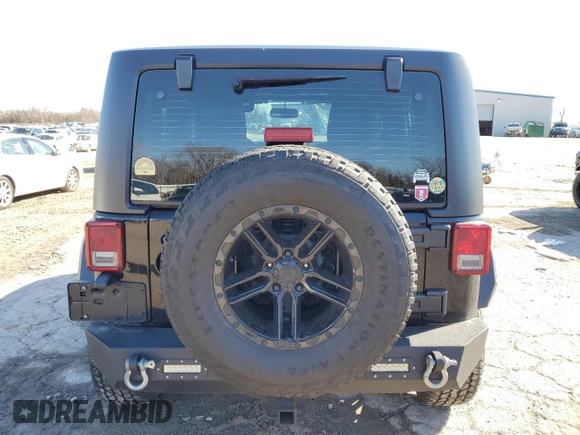 2016 Jeep Wrangler Black Bear with VIN 1C4AJWAG9GL230693, listed as a Copart auction lot 43350885 with 75,761 mi miles and Salvage title. Bid and sale history available at DreamBid. Image 6.