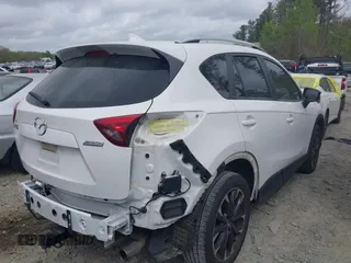 2016 Mazda CX-5 Grand Touring with VIN JM3KE2DY6G0622030, listed as a IAAI auction lot 41943466 with 110,283 mi miles. Bid and sale history available at carsss.com. Image 13.