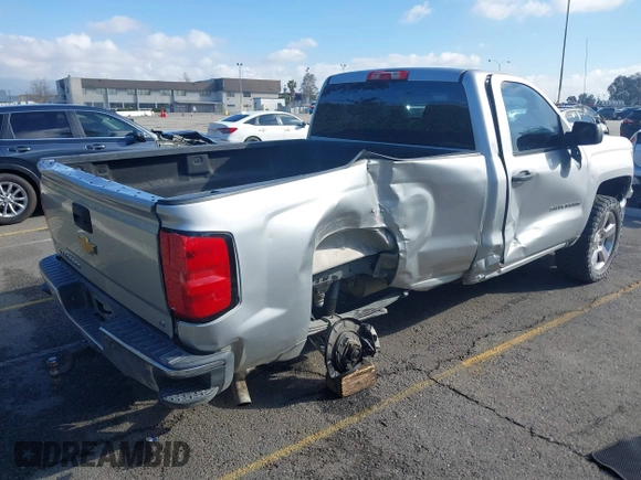 2014 Chevrolet Silverado 1500 with VIN 1GCNCREH2EZ303297, listed as a IAAI auction lot 41692877 with 115,621 mi miles and . Bid and sale history available at DreamBid. Image 4.
