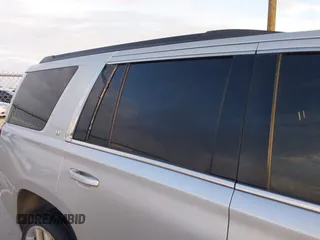 2015 Chevrolet Tahoe LT with VIN 1GNSCBKC2FR232095, listed as a IAAI auction lot 42718627 with 174,130 mi miles and . Bid and sale history available at DreamBid. Image 6.
