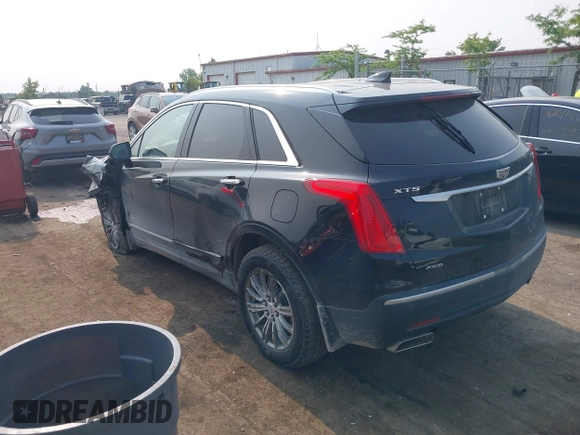 2018 Cadillac XT5 Luxury AWD with VIN 1GYKNDRSXJZ247863, listed as a IAAI auction lot 42392404 with 96,629 mi miles and . Bid and sale history available at DreamBid. Image 3.