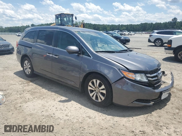 2014 Honda Odyssey EX-L with VIN 5FNRL5H62EB112280, listed as a Copart auction lot 60138645 with 167,657 mi miles and Salvage title. Bid and sale history available at DreamBid. Image 4.