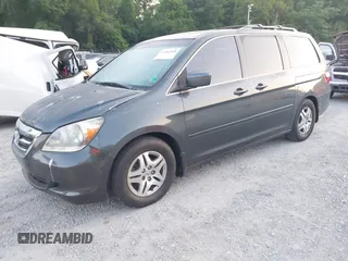 2005 Honda Odyssey EX-L with VIN 5FNRL38605B406281, listed as a IAAI auction lot 42582488 with 185,862 mi miles and . Bid and sale history available at DreamBid. Image 2.