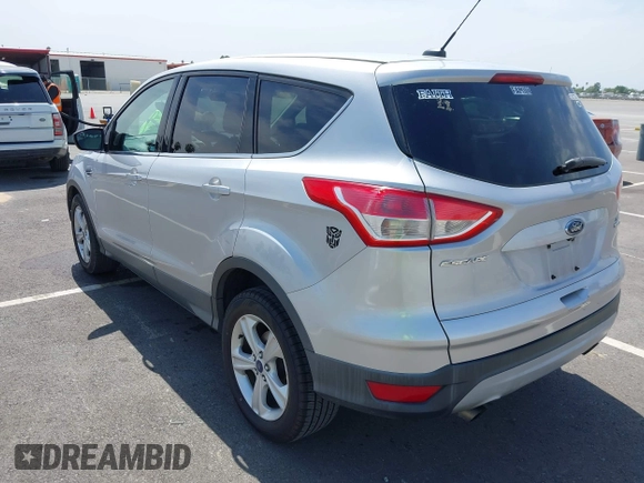 2015 Ford Escape SE with VIN 1FMCU9G93FUA26339, listed as a IAAI auction lot 42039281 with 185,729 mi miles and . Bid and sale history available at DreamBid. Image 3.