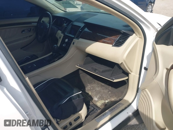 2016 Ford Taurus Limited with VIN 1FAHP2F83GG105842, listed as a IAAI auction lot 41903478 with Not Provided miles and . Bid and sale history available at DreamBid. Image 5.