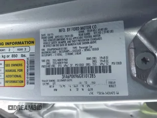 2016 Ford Fusion Titanium with VIN 3FA6P0K96GR101285, listed as a IAAI auction lot 41214633 with 113,633 mi miles and . Bid and sale history available at carsss.com. Image 9.