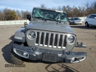 2019 Jeep Wrangler Unlimited Sahara with VIN 1C4HJXEG7KW573265, listed as a Copart auction lot 42683745 with 63,393 mi miles and Salvage title. Bid and sale history available at DreamBid. Image 5.