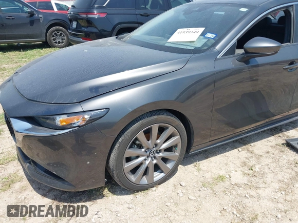 2021 Mazda 3 Preferred with VIN JM1BPACL1M1317639, listed as a IAAI auction lot 41939340 with 51,195 mi miles and . Bid and sale history available at DreamBid. Image 13.