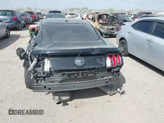 2015 Ford Mustang EcoBoost with VIN 1FA6P8THXF5395540, listed as a IAAI auction lot 41812384 with 118,150 mi miles and . Bid and sale history available at carsss.com. Image 6.