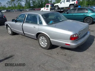2000 Jaguar XJ with VIN SAJDA14C4YLF13470, listed as a IAAI auction lot 42136313 with 237,063 mi miles and . Bid and sale history available at DreamBid. Image 3.