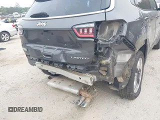 2020 Jeep Compass Limited with VIN 3C4NJCCB0LT128635, listed as a IAAI auction lot 42085121 with 166,511 mi miles and . Bid and sale history available at DreamBid. Image 18.