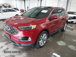 2020 Ford Edge Titanium z VIN 2FMPK4K98LBB39819, wystawiony jako IAAI lot #41947377 z przebiegiem 69 467 mil mil oraz . Historia ofert i sprzedaży dostępna na DreamBid. Obrazek 2.