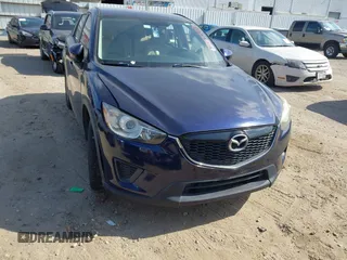 2014 Mazda CX-5 Sport z VIN JM3KE2BE6E0368602, wystawiony jako IAAI lot #42067339 z przebiegiem 179 649 mil mil oraz . Historia ofert i sprzedaży dostępna na DreamBid. Obrazek 1.