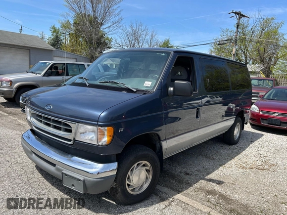 1998 Ford Econoline Passenger XL with VIN 1FMRE11L6WHB65841, listed as a IAAI auction lot 42123953 with 63,138 mi miles. Bid and sale history available at carsss.com. Image 2.