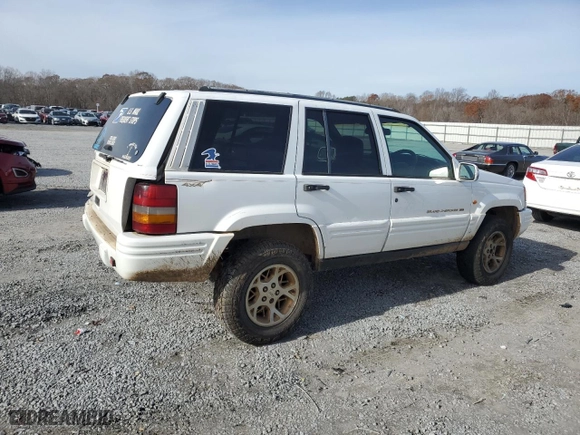 1996 Jeep Grand Cherokee Limited with VIN 1J4GZ78S2TY123592, listed as a Copart auction lot 84387624 with 0 miles and Salvage Title. Bid and sale history available at carsss.com. Image 3.