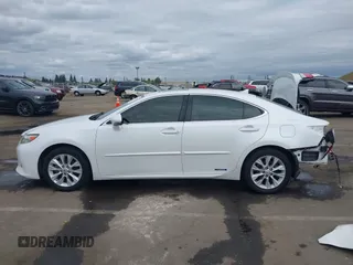2014 Lexus ES 300h with VIN JTHBW1GG5E2064531, listed as a IAAI auction lot 42119900 with 210,354 mi miles and . Bid and sale history available at DreamBid. Image 14.