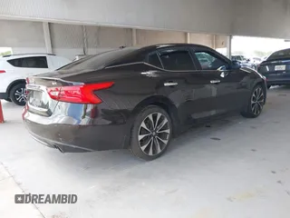 2016 Nissan Maxima SV with VIN 1N4AA6AP5GC413563, listed as a IAAI auction lot 42196144 with 209,711 mi miles and . Bid and sale history available at DreamBid. Image 4.