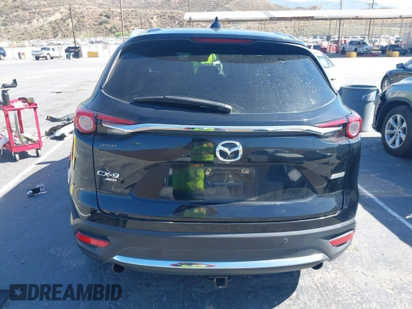 2017 Mazda CX-9 Grand Touring with VIN JM3TCBDY0H0130671, listed as a IAAI auction lot 42514237 with 81,016 mi miles and . Bid and sale history available at DreamBid. Image 16.