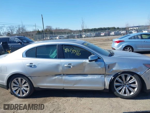 2013 Lincoln MKS EcoBoost with VIN 1LNHL9FT9DG613100, listed as a IAAI auction lot 41614096 with 207,789 mi miles. Bid and sale history available at carsss.com. Image 13.