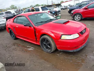 2000 Ford Mustang z VIN 1FAFP4043YF229321, wystawiony jako IAAI lot #42124386 z przebiegiem 132 490 mil mil oraz . Historia ofert i sprzedaży dostępna na DreamBid. Obrazek 1.
