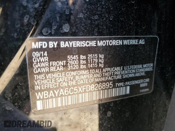 2015 BMW 7 Series 740i with VIN WBAYA6C5XFD826895, listed as a Copart auction lot 66889794 with Not Provided miles and Salvage Title. Bid and sale history available at DreamBid. Image 14.