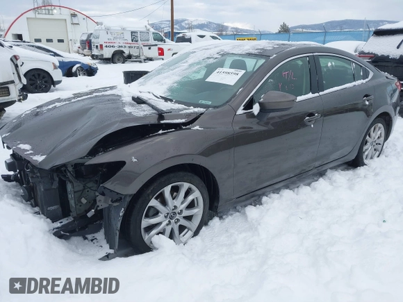 2016 Mazda Mazda6 i Touring with VIN JM1GJ1V58G1458699, listed as a IAAI auction lot 41598598 with 73,576 mi miles. Bid and sale history available at carsss.com. Image 2.
