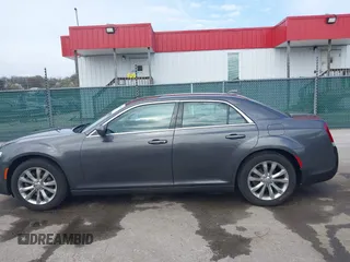 2019 Chrysler 300 Touring with VIN 2C3CCARG3KH581149, listed as a IAAI auction lot 41961358 with 97,714 mi miles and . Bid and sale history available at carsss.com. Image 14.