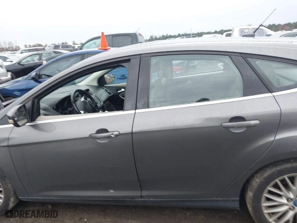 2012 Ford Focus SEL with VIN 1FAHP3M24CL200528, listed as a IAAI auction lot 41063250 with 155,328 mi miles. Bid and sale history available at carsss.com. Image 14.