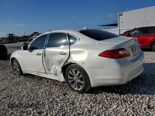 2013 Infiniti M37 with VIN JN1BY1AP0DM511986, listed as a Copart auction lot 86157824 with 125,464 mi miles and Salvage Title. Bid and sale history available at carsss.com. Image 2.