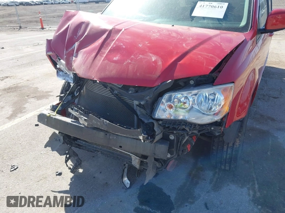 2014 Dodge Grand Caravan SXT with VIN 2C4RDGCG6ER477008, listed as a IAAI auction lot 41770610 with 89,843 mi miles and . Bid and sale history available at DreamBid. Image 6.