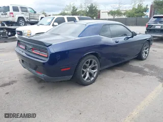 2016 Dodge Challenger SXT Plus with VIN 2C3CDZAG3GH329741, listed as a IAAI auction lot 41783891 with 111,388 mi miles. Bid and sale history available at carsss.com. Image 4.