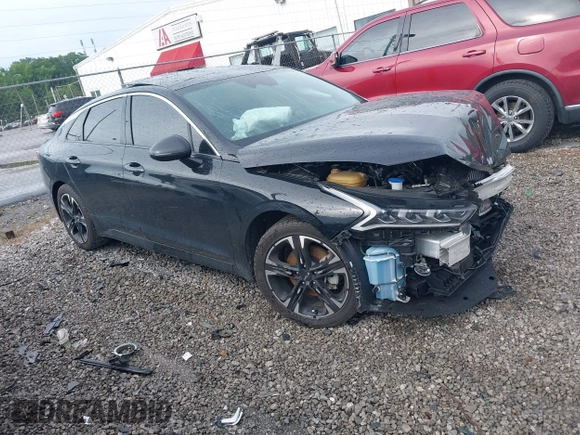 2023 Kia K5 GT-Line z VIN 5XXG64J20PG213348, wystawiony jako IAAI lot #42333459 z przebiegiem 34 392 mil mil oraz . Historia ofert i sprzedaży dostępna na DreamBid. Obrazek 1.